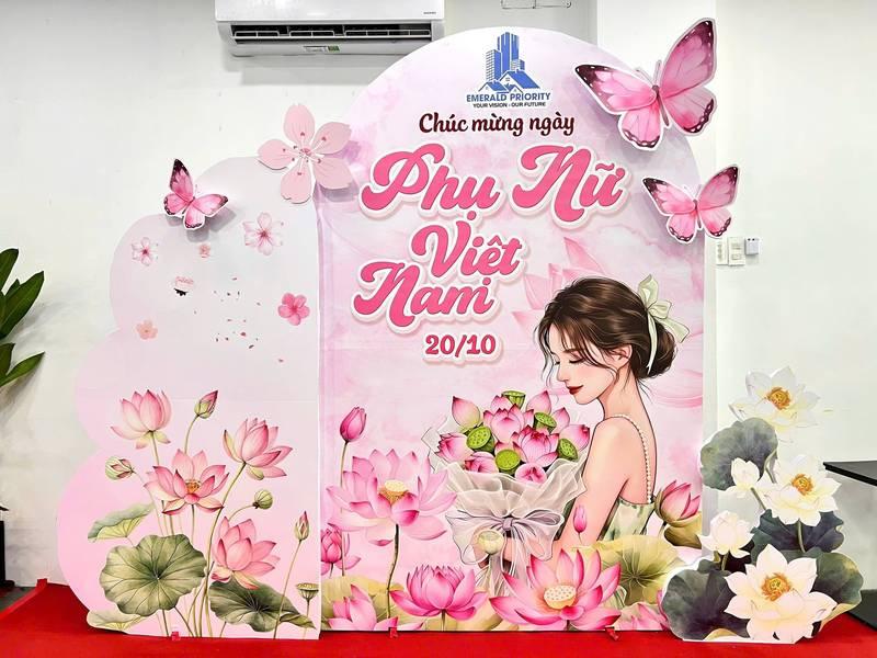 Backdrop trang trí ngày phụ nữ công ty với tiểu cảnh hoa sen và bướm dịp 20/10 văn phòng.